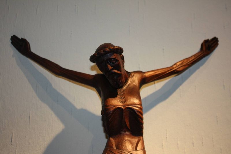 A vintage 1920's carved wooden Jesus Christ cross sculpture, signed 'F. T.'