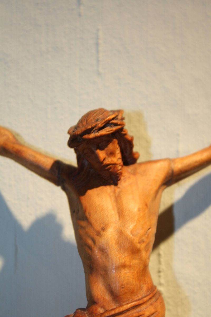 A small antique 19th century hand-carved wooden Jesus Christ figurine