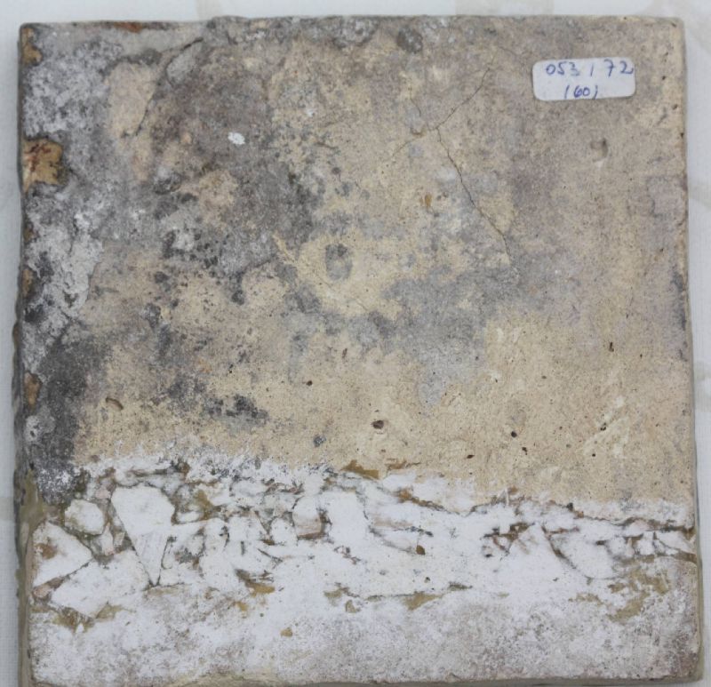 A rare 1600 hand-painted polychrome Delft stonework medallion tile, showing a running unicorn