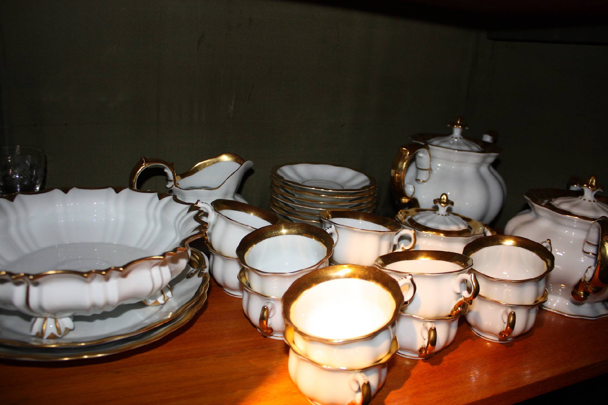 A second half 20th century white and golden tea or coffee serving set by Fuerstenberg, Germany, 10 cups and saucers, 27 parts
