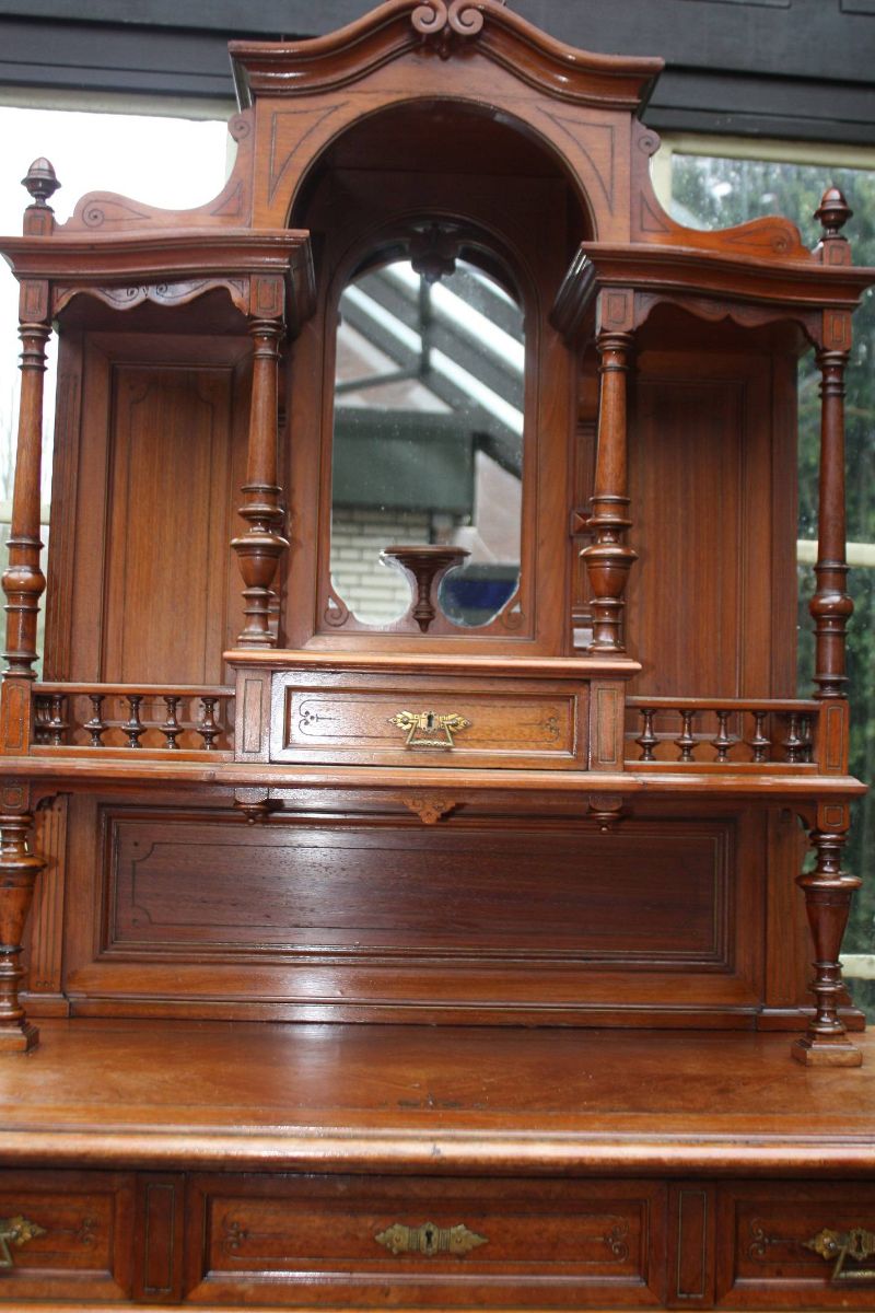 A late 19th century walnut show cabinet display cupboard