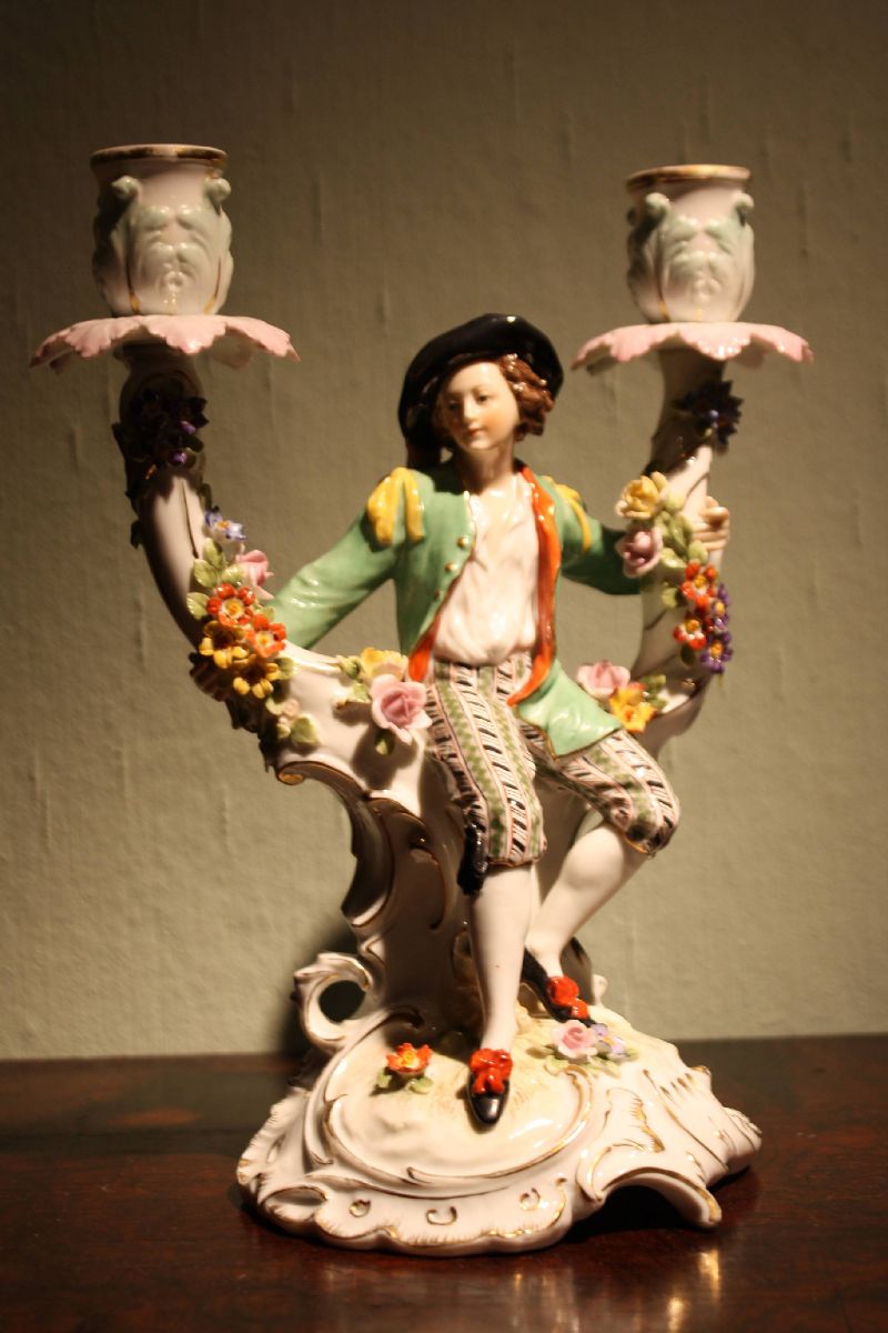 A unique late 18th century German figurative hand painted two-armed porcelain candle holder signed by Hoechst, Germany