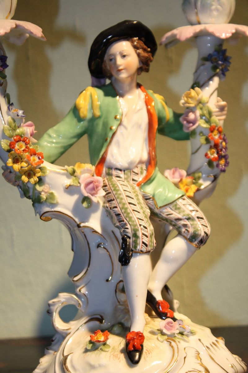 A unique late 18th century German figurative hand painted two-armed porcelain candle holder signed by Hoechst, Germany