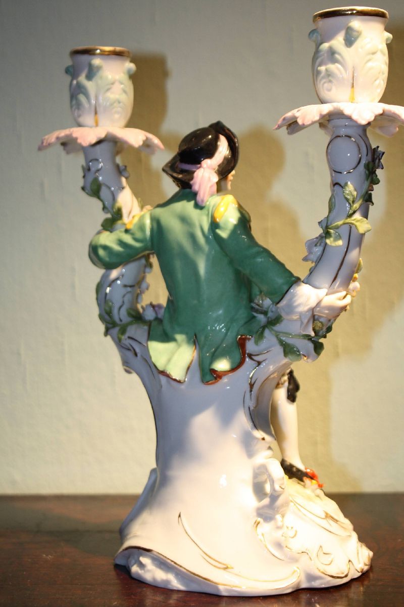 A unique late 18th century German figurative hand painted two-armed porcelain candle holder signed by Hoechst, Germany