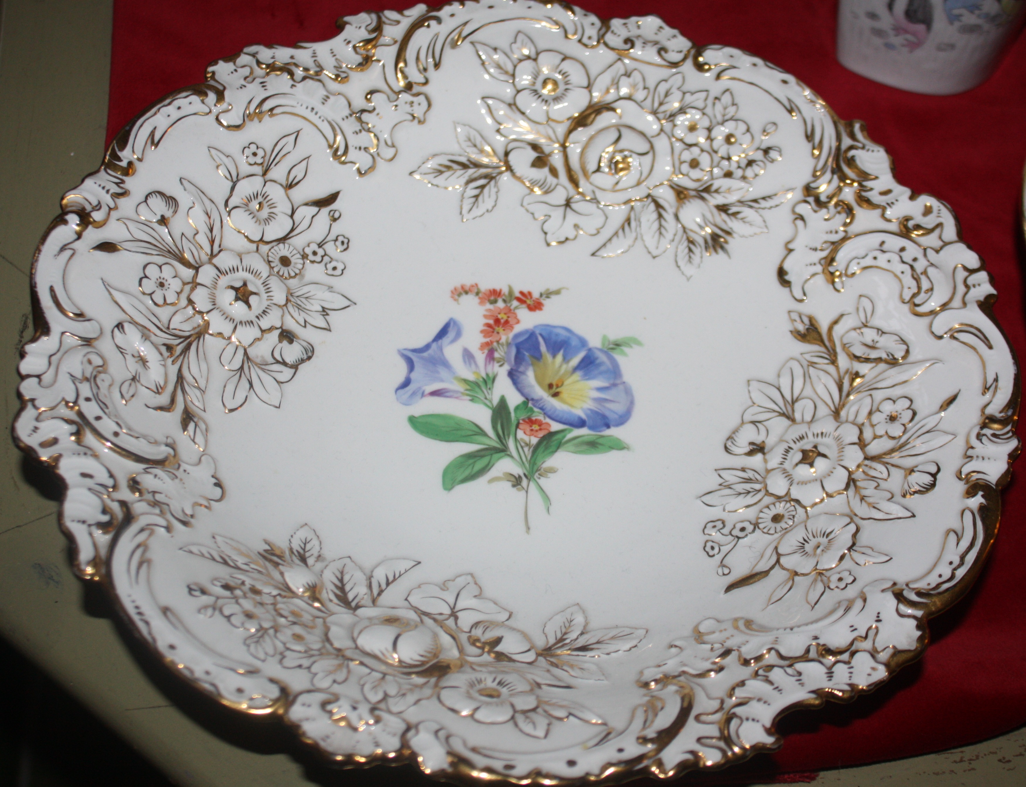 A big beautiful 20th century white and golden ornate Meissen relief plate