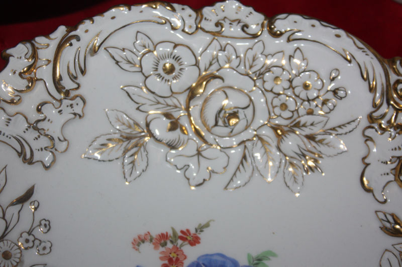 A big beautiful 20th century white and golden ornate Meissen relief plate