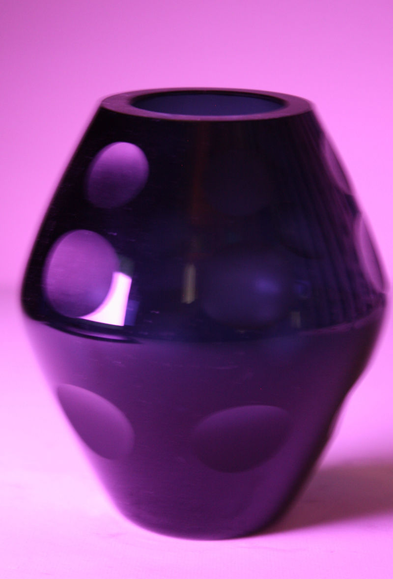 A small Mid-Century dark blue glass vase