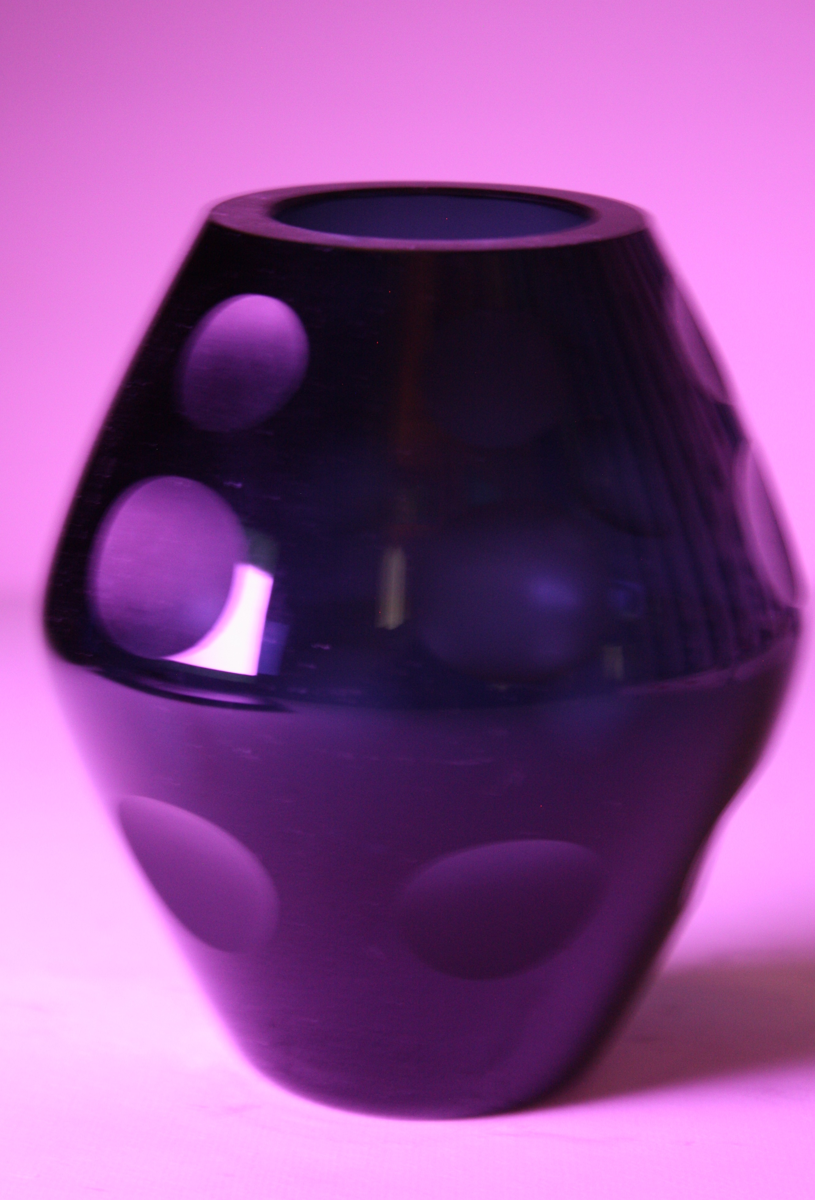 A small Mid-Century dark blue glass vase