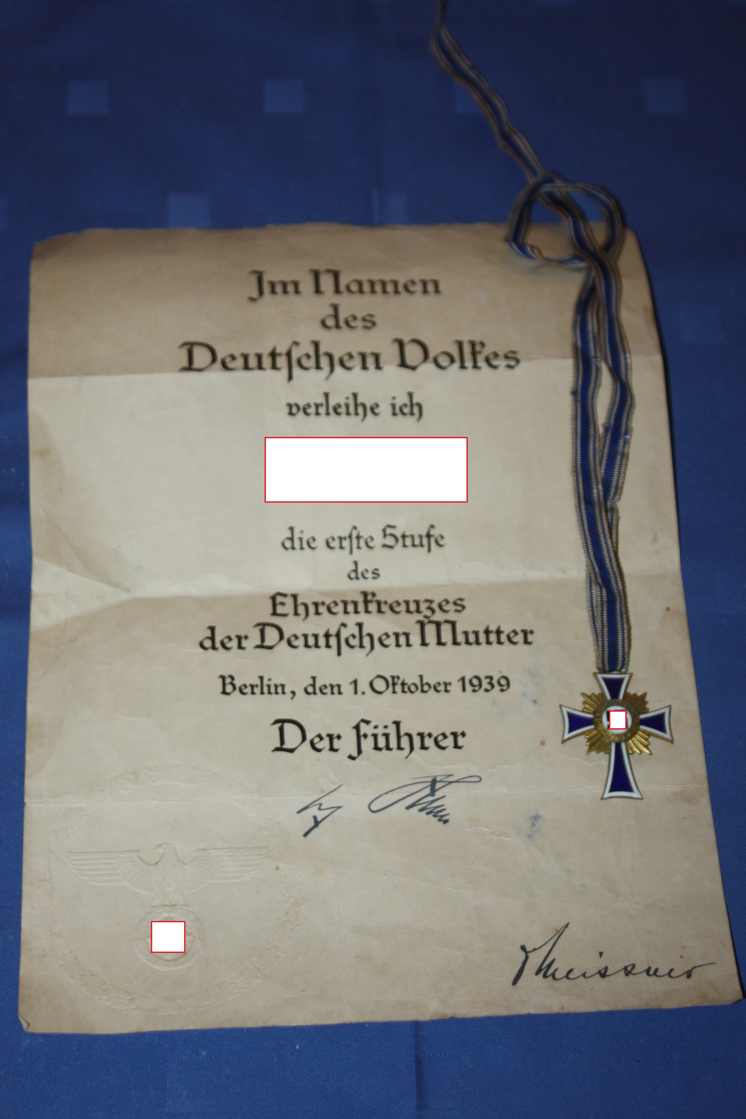 A WW2 Mother's Cross Mutterkreuz 1. Stufe with certificate Award for mothers of 8 children