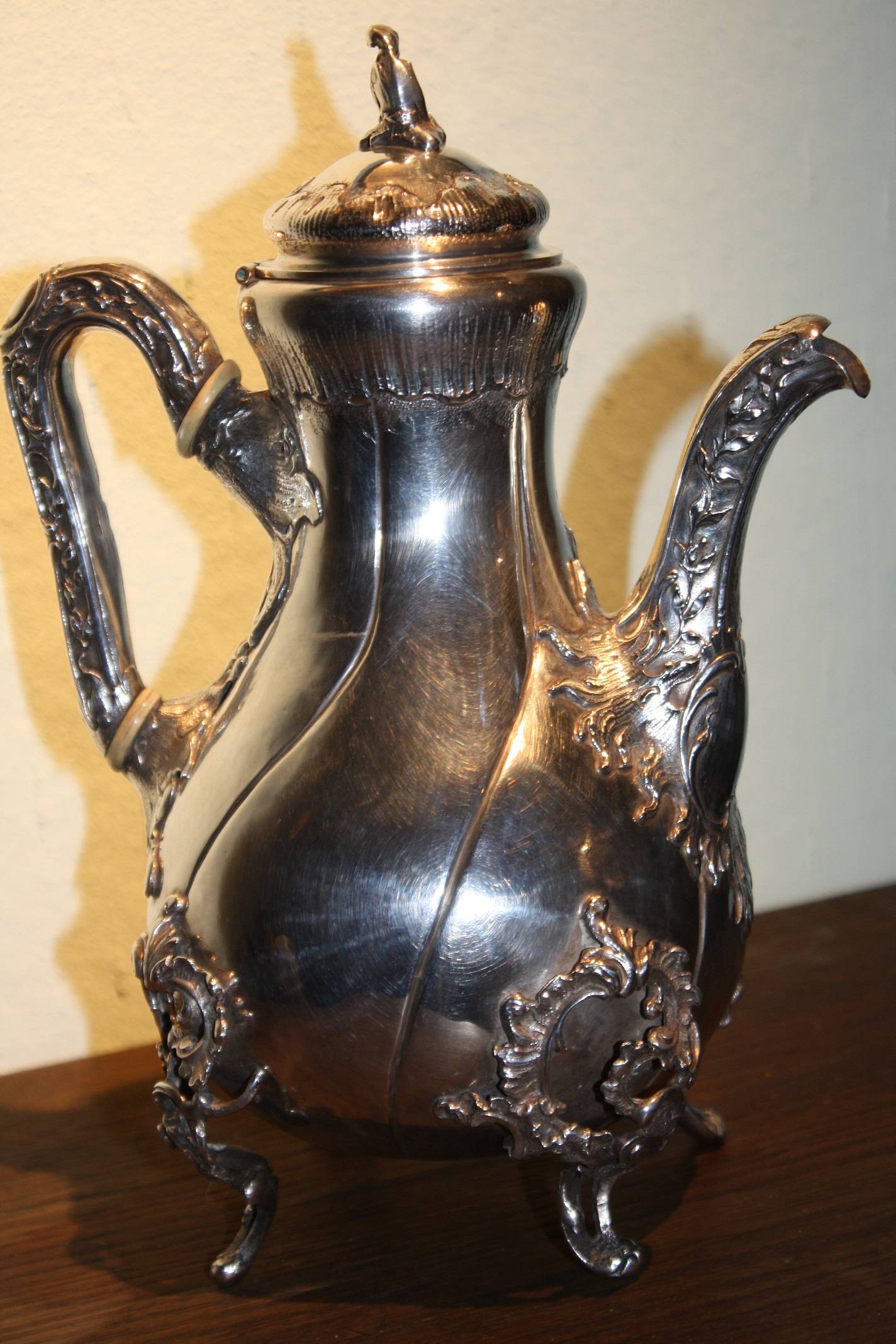 A decorative second half, 19th century antique silver coffee pot