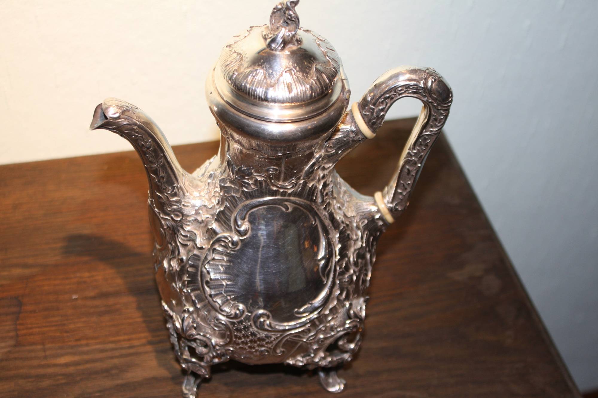 A decorative second half, 19th century antique silver coffee pot
