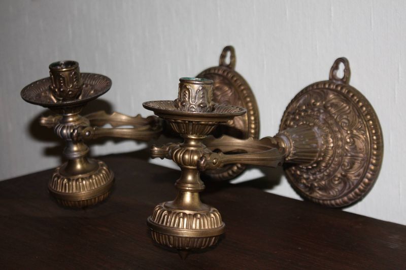 A pair of 20th century vintage brass traditional antique ship candle holders