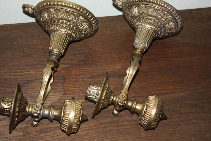 A pair of 20th century vintage brass traditional antique ship candle holders