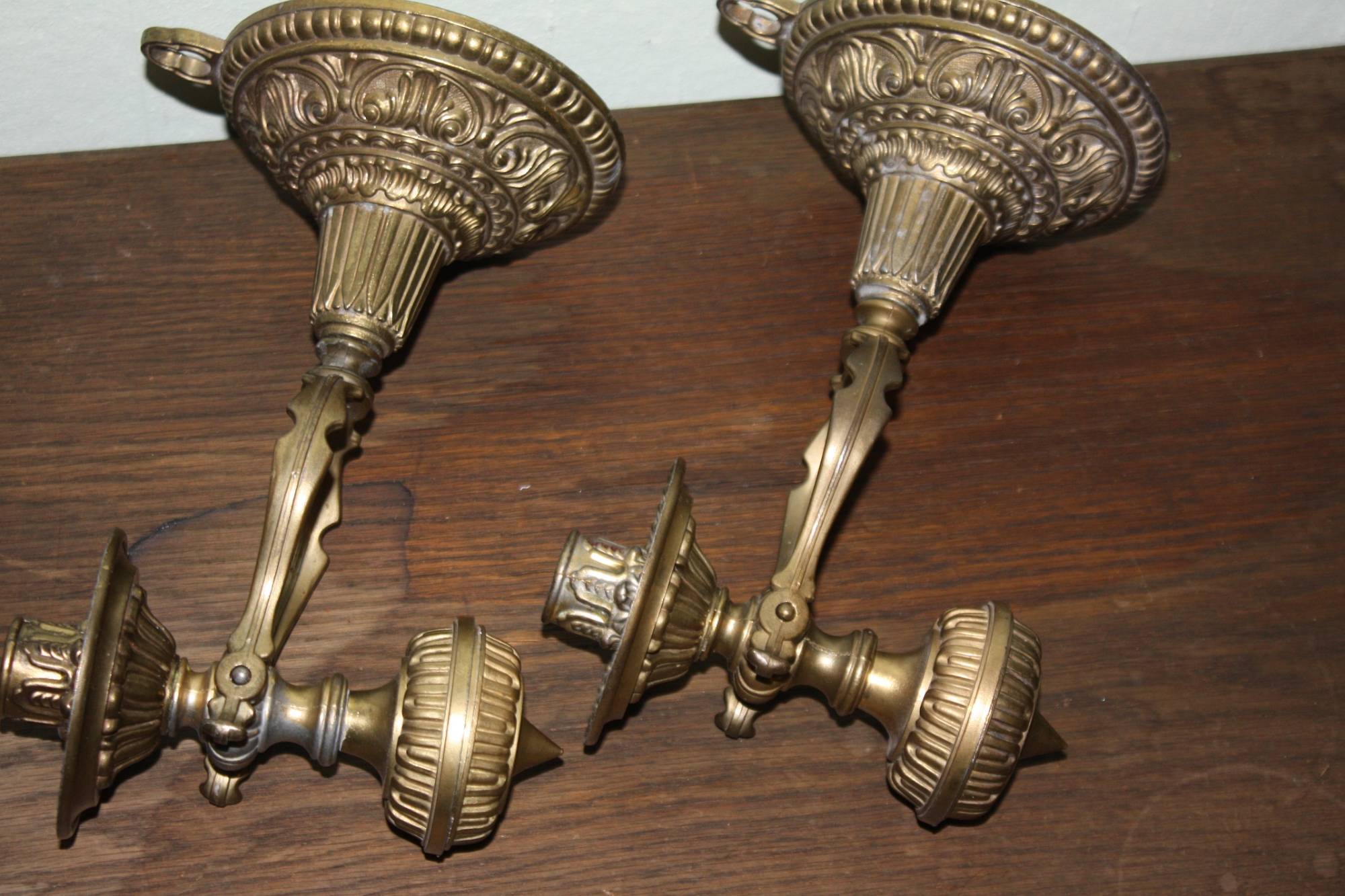 A pair of 20th century vintage brass traditional antique ship candle holders
