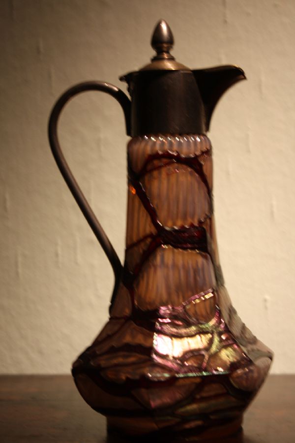 A vintage Bohemian 1910 Art Nouveau iridescent glass pitcher by 'Wilhelm Kralik and sons'