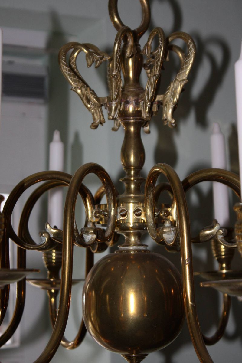 A 19th century flamish or dutch all brass antique chandelier with 8 arms