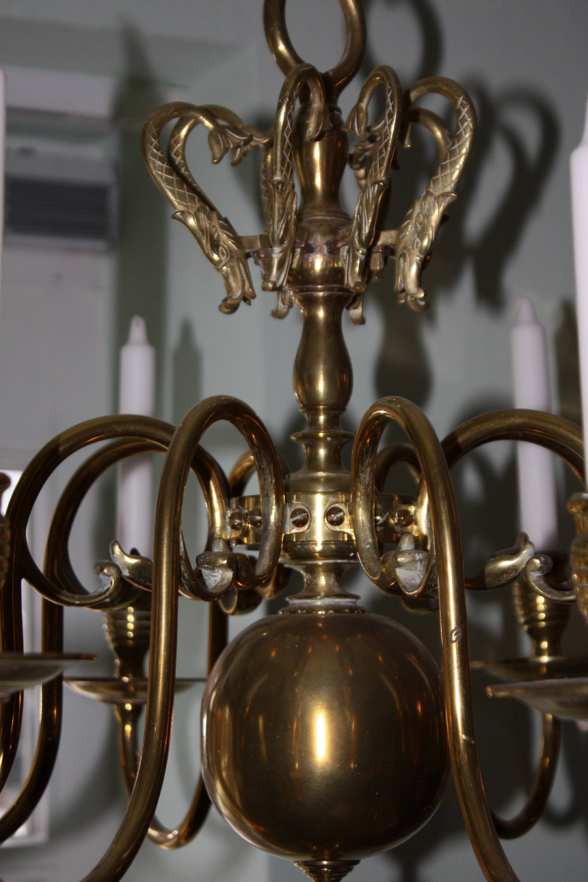 A 19th century flamish or dutch all brass antique chandelier with 8 arms