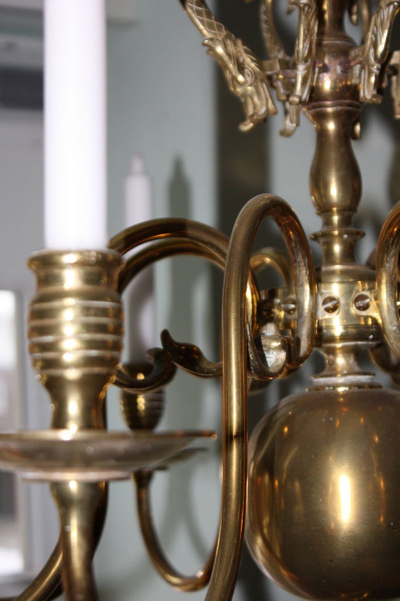 A 19th century flamish or dutch all brass antique chandelier with 8 arms