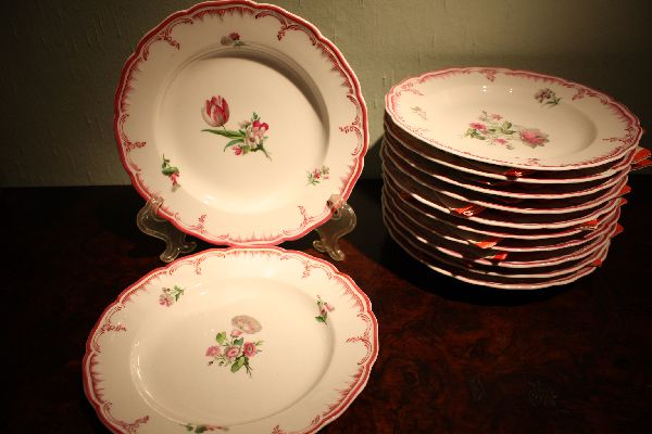 12 Mid-19th century porcelain floral ornate KPM dessert plates