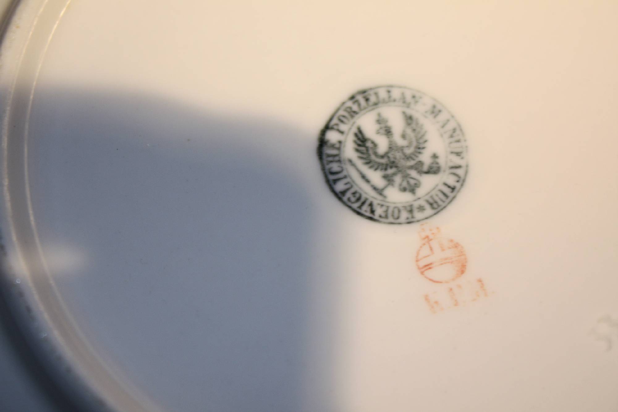 12 Mid-19th century hand-painted porcelain floral ornate KPM Berlin dessert plates