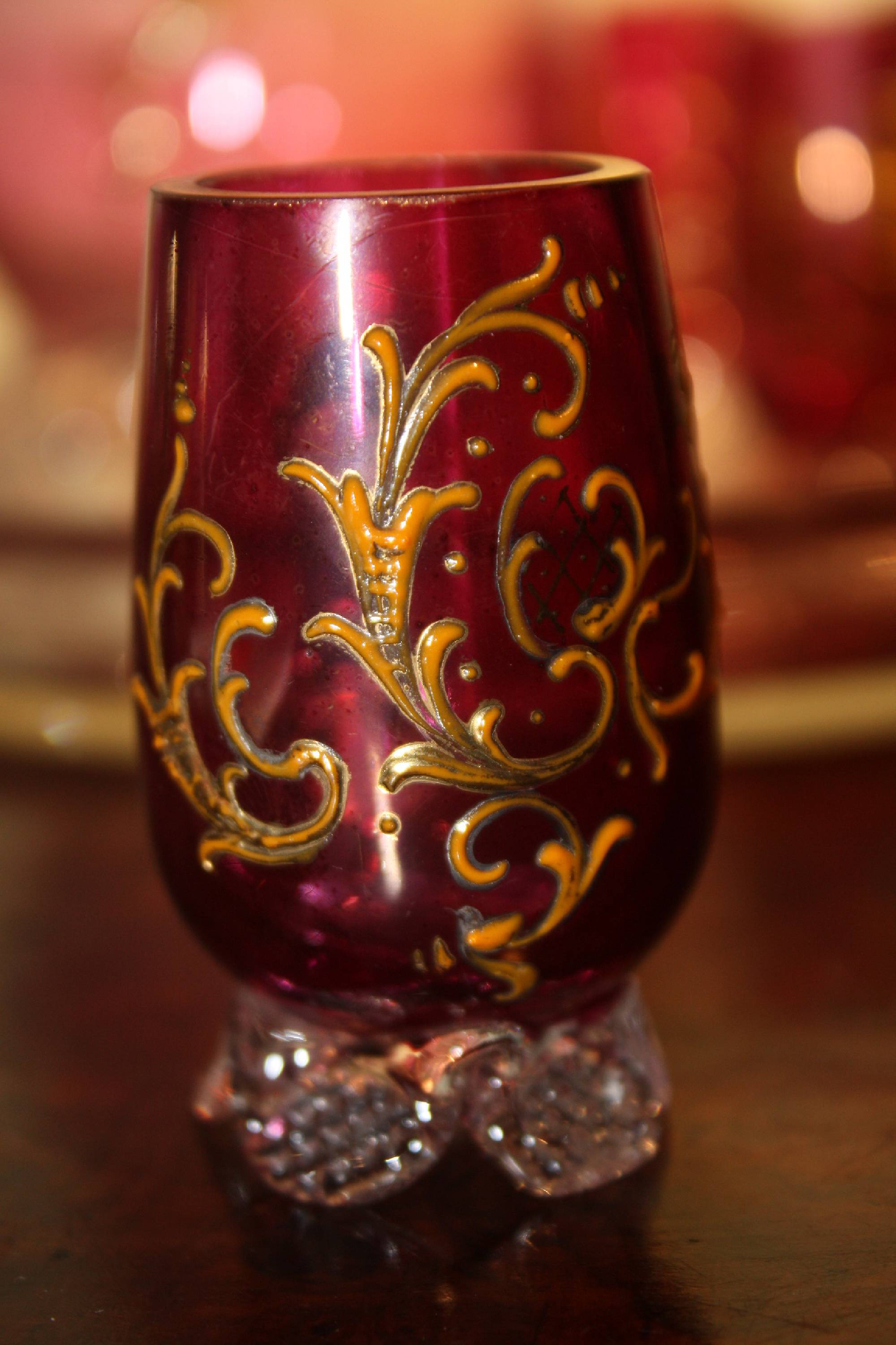 A vintage 1900 Bohemian pink glass ornate rocailles liquor pitcher with 7 glasses on a tray