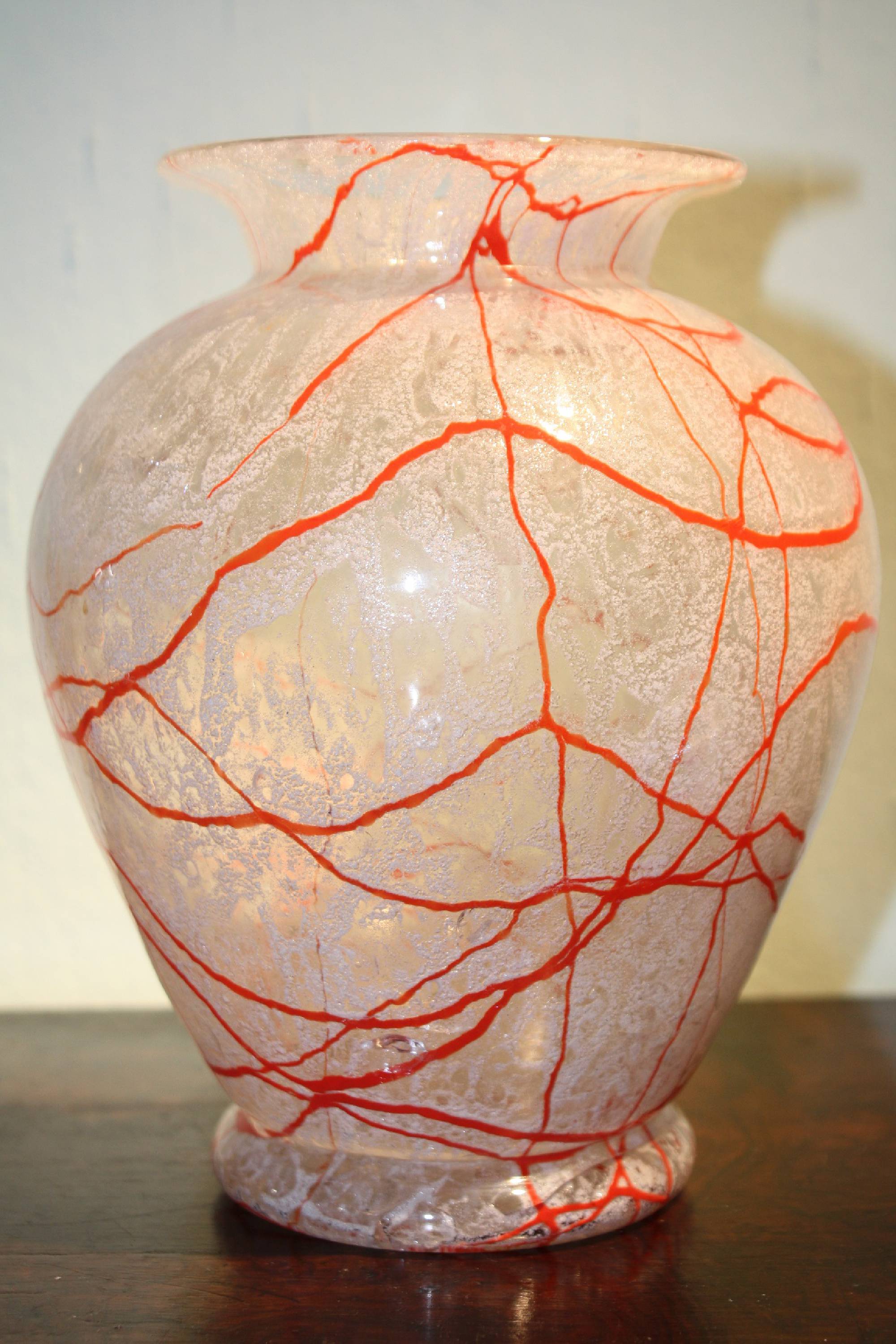 A vintage 20th century white and red glass vase by 'Joh. Loetz Witwe Klostermuehle'