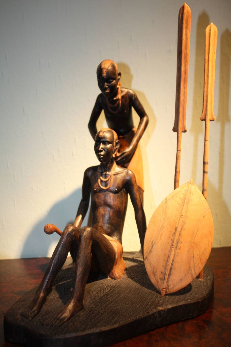 East-African handcarved wooden tribal Massai sculpture showing two hunters