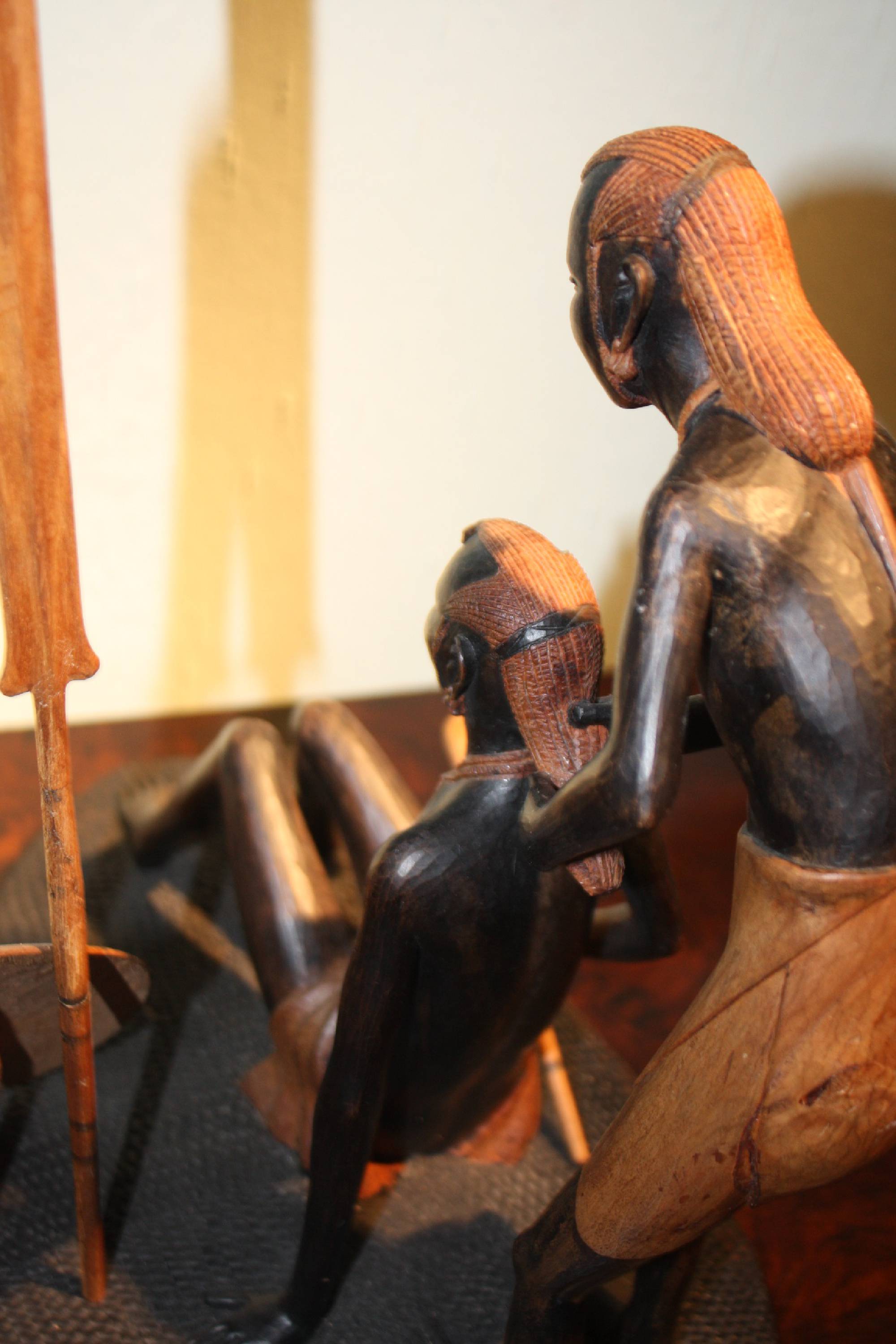 East-African handcarved wooden tribal Massai sculpture showing two hunters