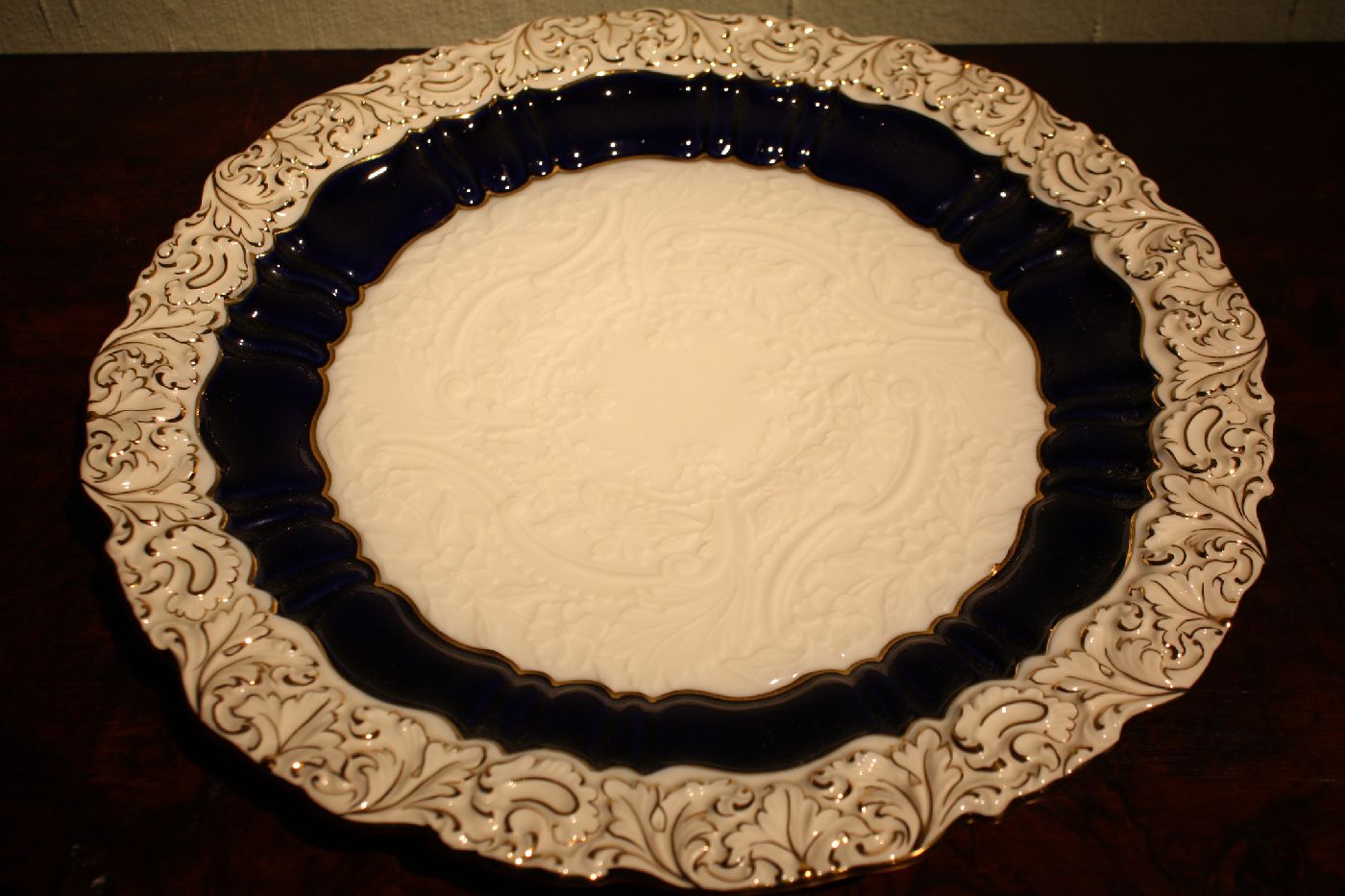 A decorative 20th century blue, white and golden ornate Meissen relief plate,