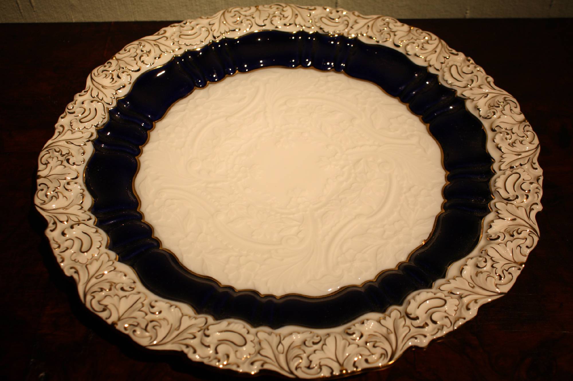 A decorative 20th century blue, white and golden ornate Meissen relief plate,