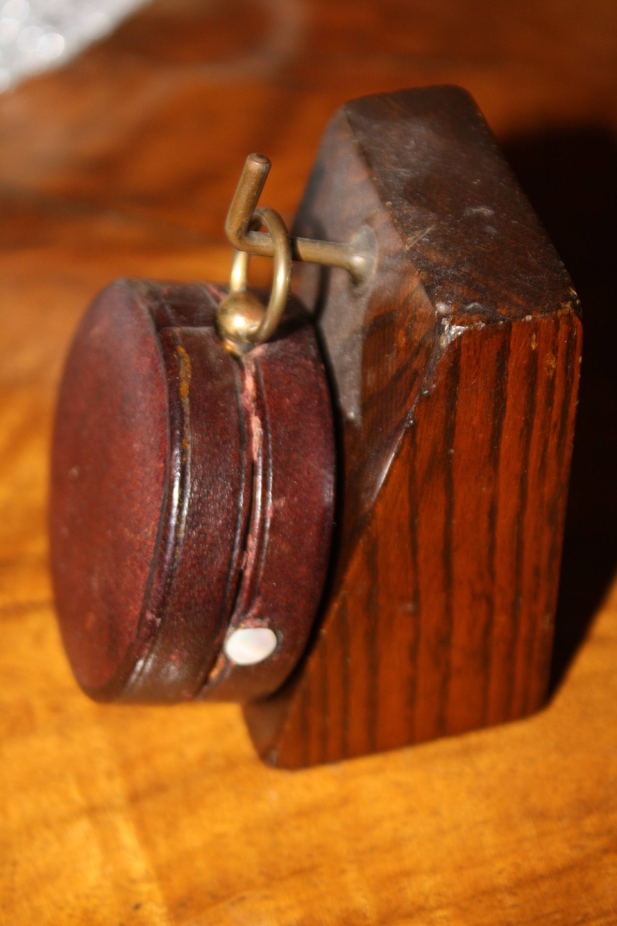 Small antique English travel-size brass barometer in a leather case, made by 'Negretti & Zambra', London