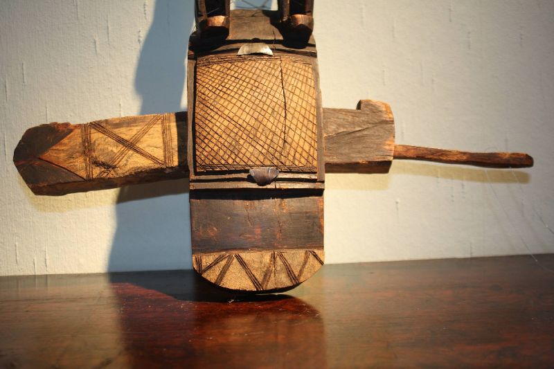 An African handcarved wooden tribal Dogon, Mali door lock with a key