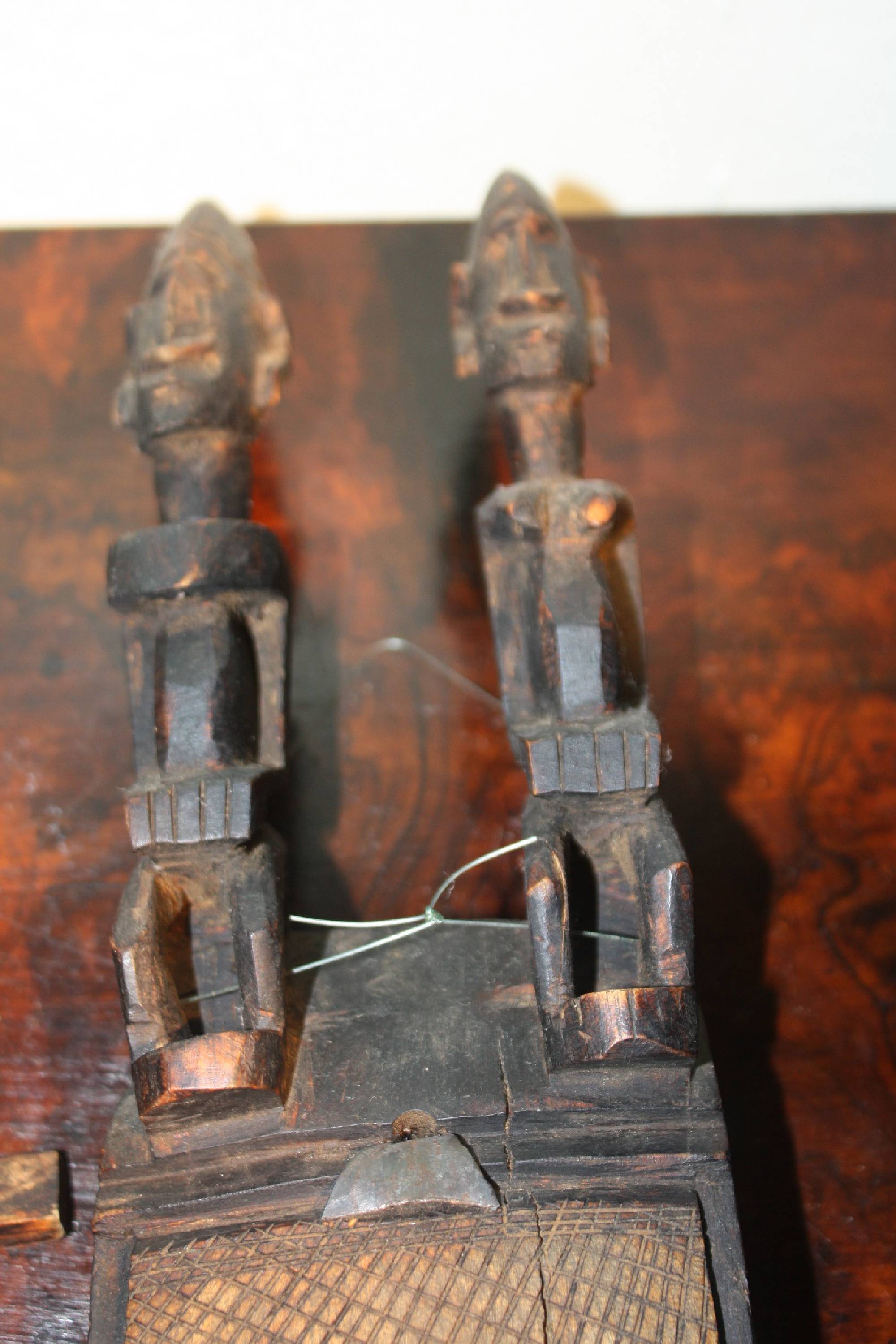 An African handcarved wooden tribal Dogon, Mali door lock with a key