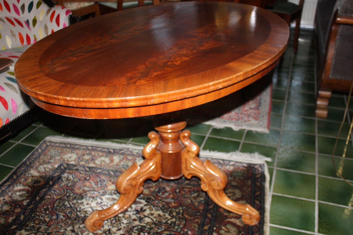 A late 19th century oval walnut burl wood veneer center table