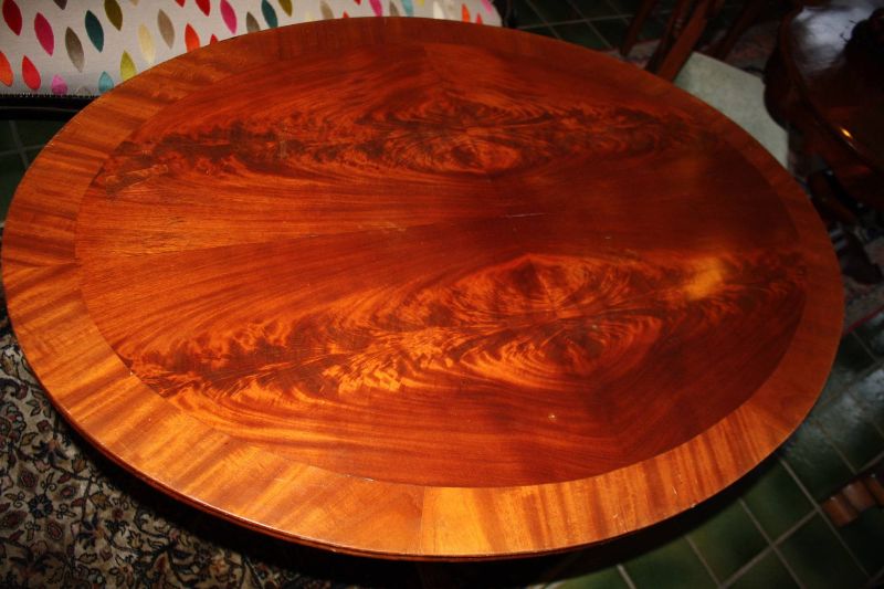 A late 19th century oval walnut burl wood veneer center table