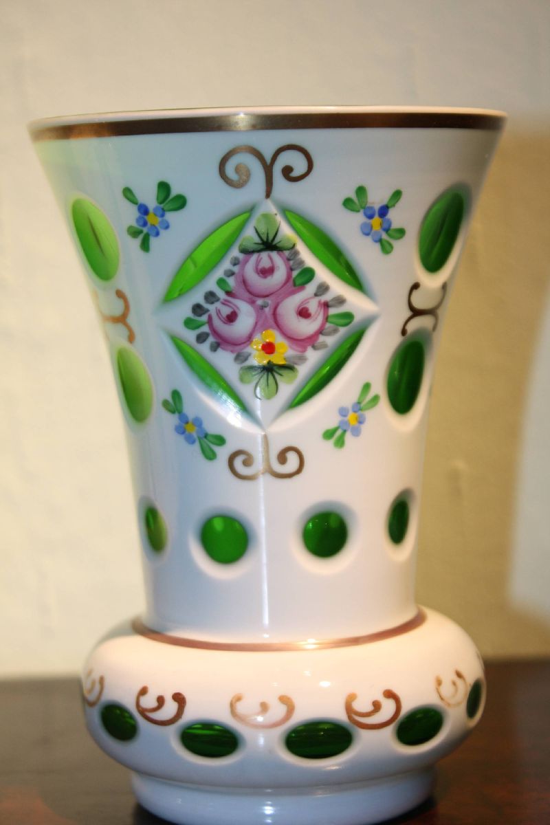 A cute vintage Bohemian 19th century green glass, white milk glass overlay and painted flowers vase