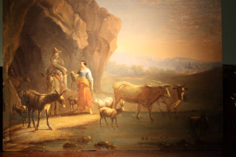 A small 19th century italian landscape painting with people and animals, oil on wood, signed Heinrich Vosberg, (* 1833, Leer, + 1891, Gmunden)