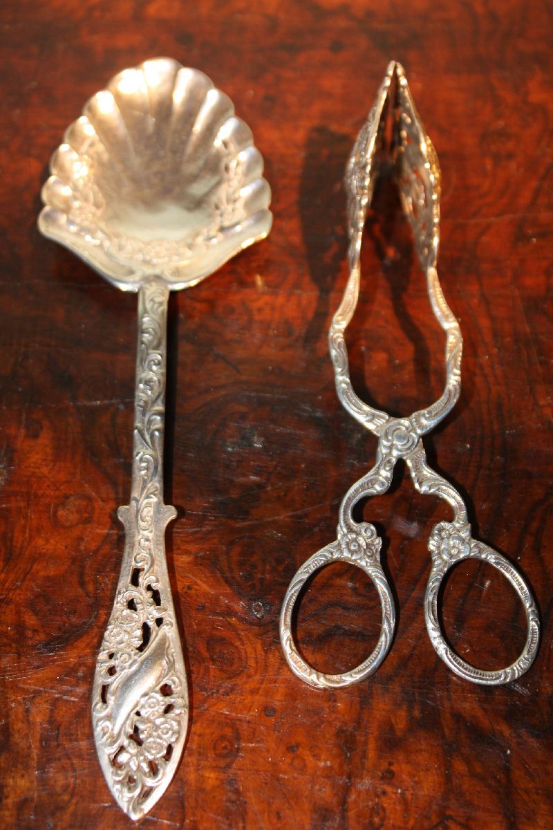 Two vintage 20th century 800 silver ornate tableware pieces, a cream spoon and pastry scissors marked, Christoph Widmann