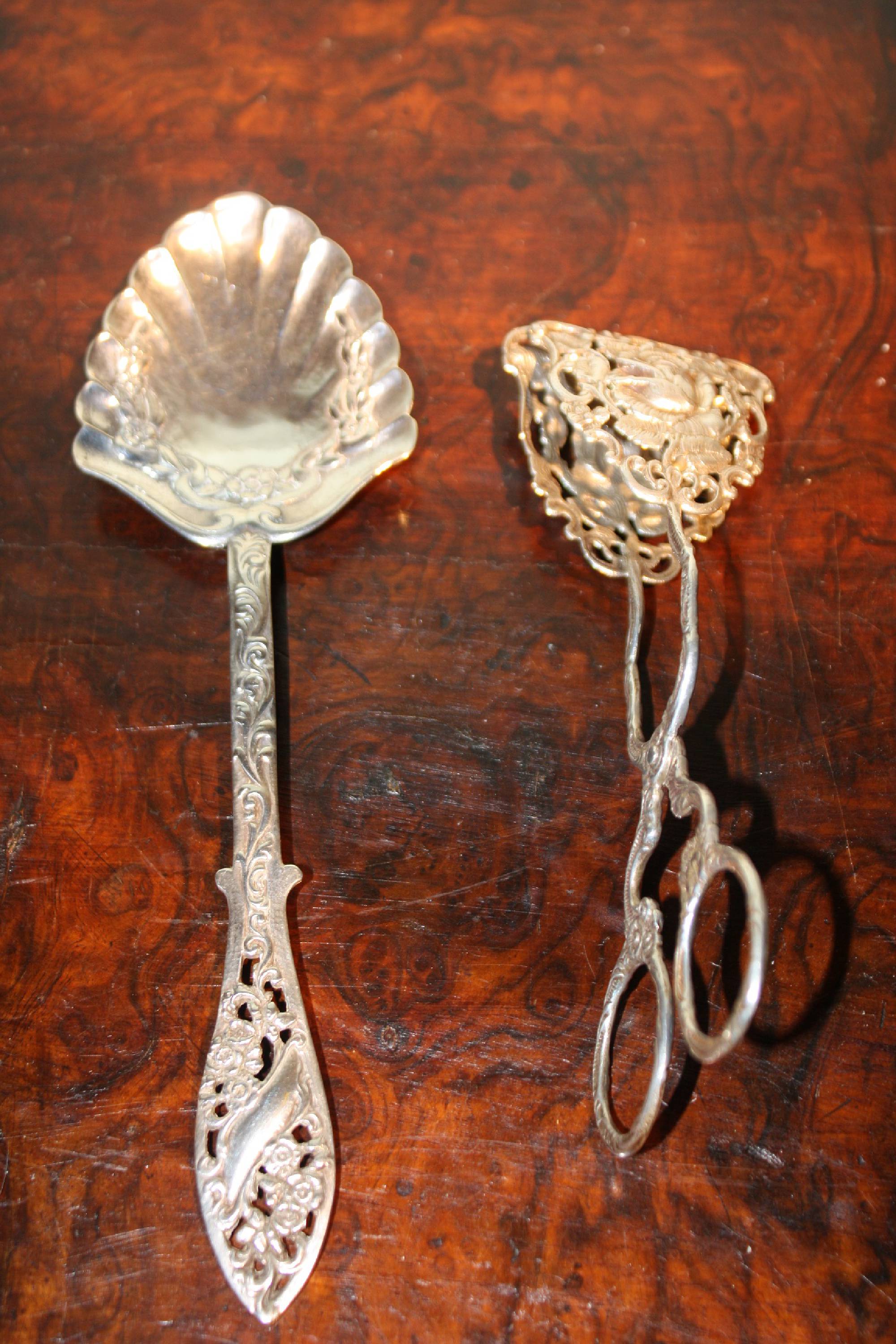 Two vintage 20th century 800 silver ornate tableware pieces, a cream spoon and pastry scissors marked, Christoph Widmann