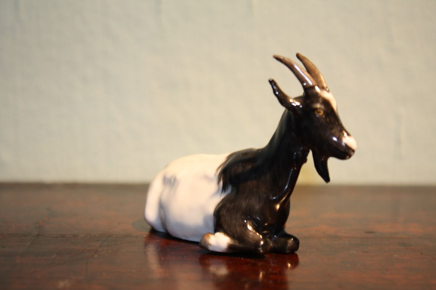 A very small vintage antique 1900 hand-painted Meissen porcelain figurine mountain goat